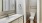 a bathroom with a sink toilet and mirror