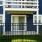 a blue building with a white balcony